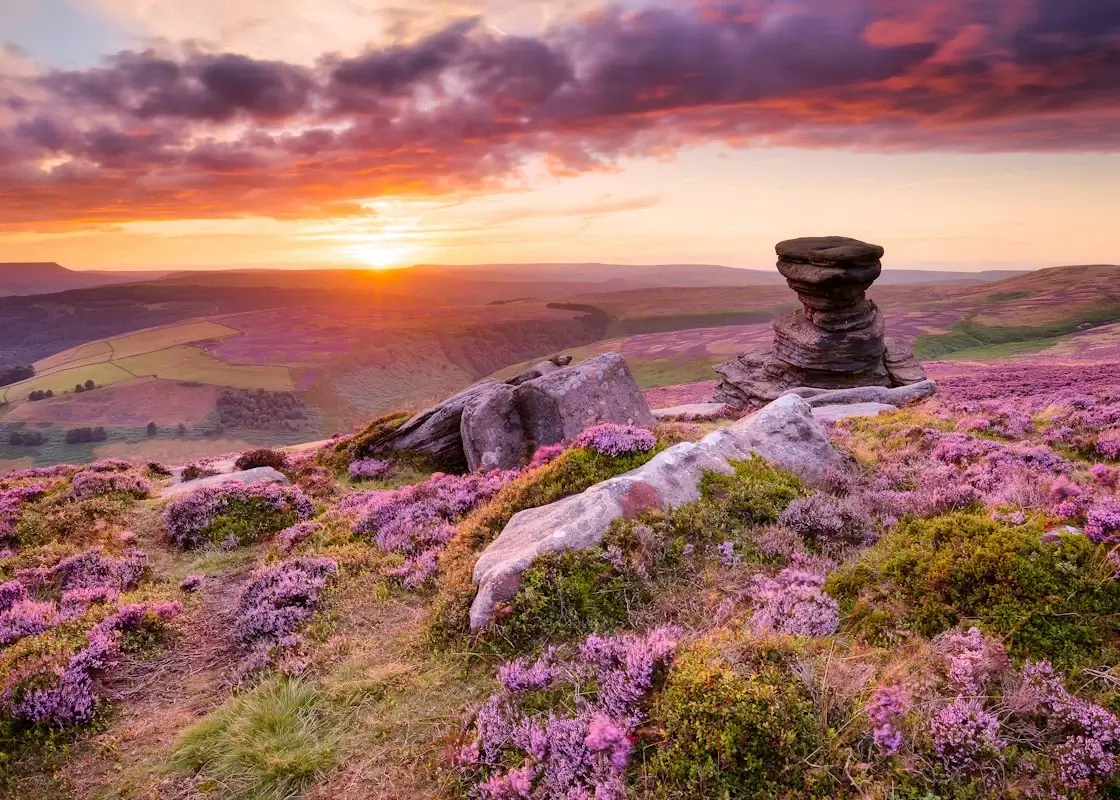 Rolling limestone dales and gritstone edges of the Peak District in Derbyshire